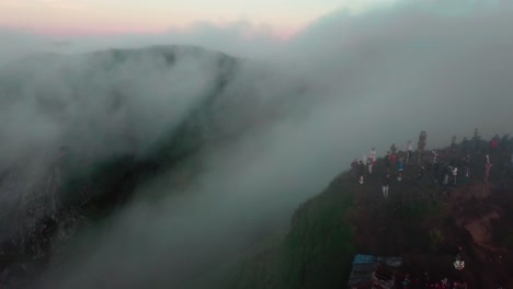 Hikers-watching-a-sunrise-on-top-of-mount-Batur