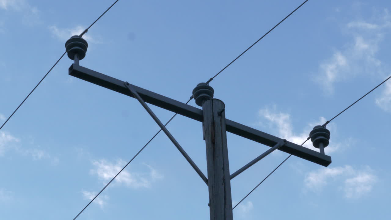 European Electric Power Lines and moving clouds, Close static shot