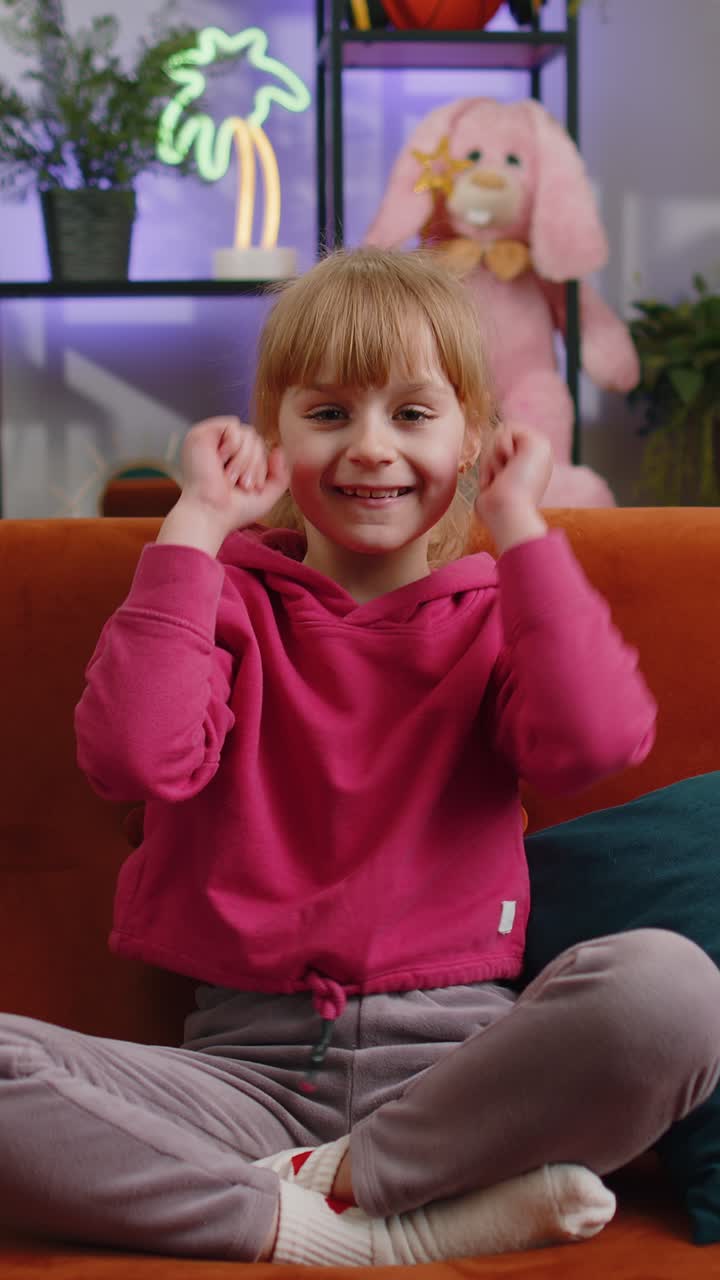 Child kid girl shouting celebrating success winning goal achievement good news lucky play game