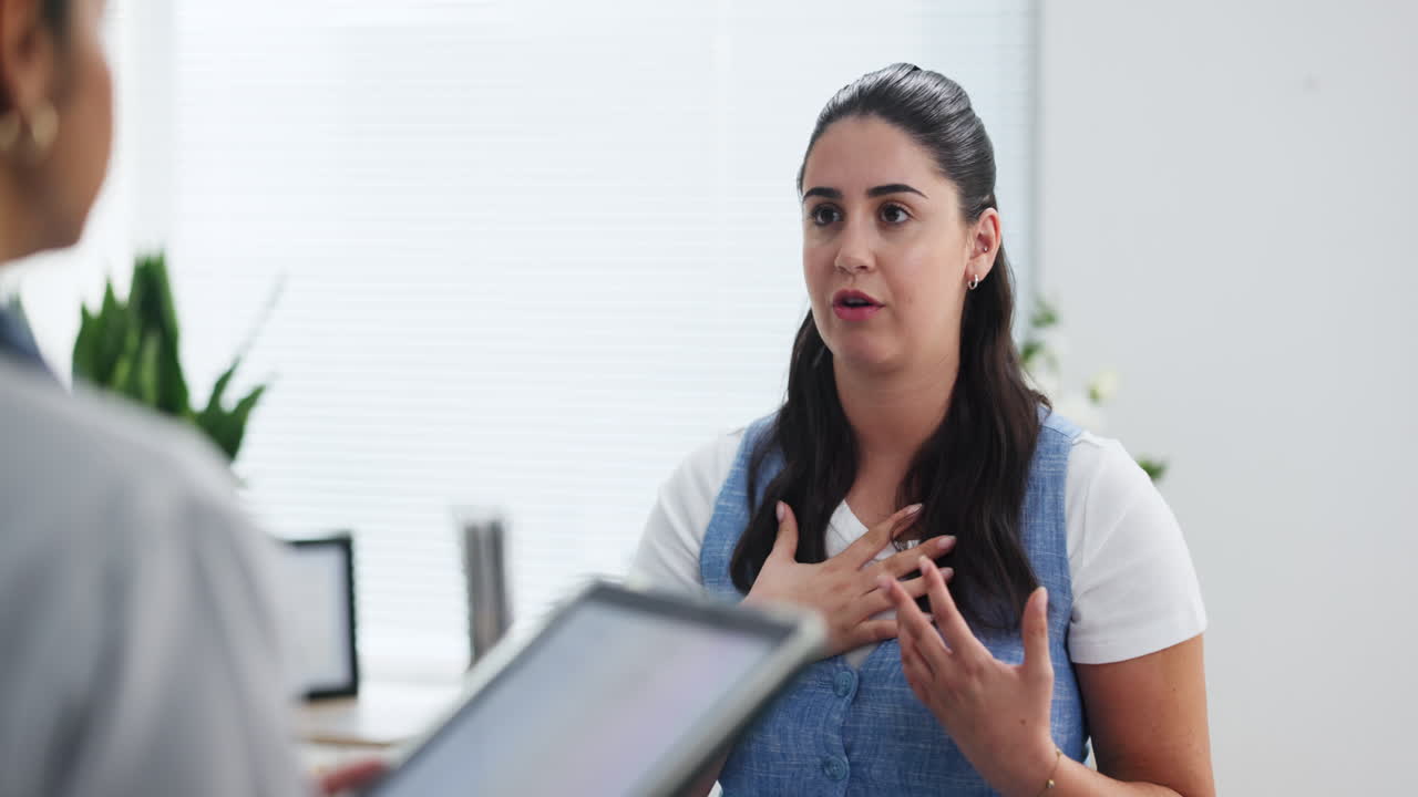 Woman Talking and Gesturing During a Professional Conversation