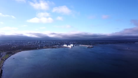 drone moving along the shipyard of tallinn on the evening