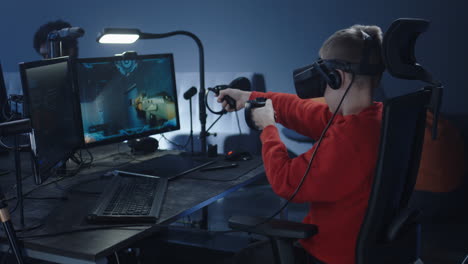 boy playing virtual reality game