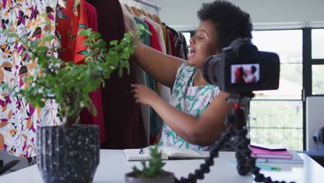 African-american-female-plus-size-vlogger-recording-a-video-about-fashion