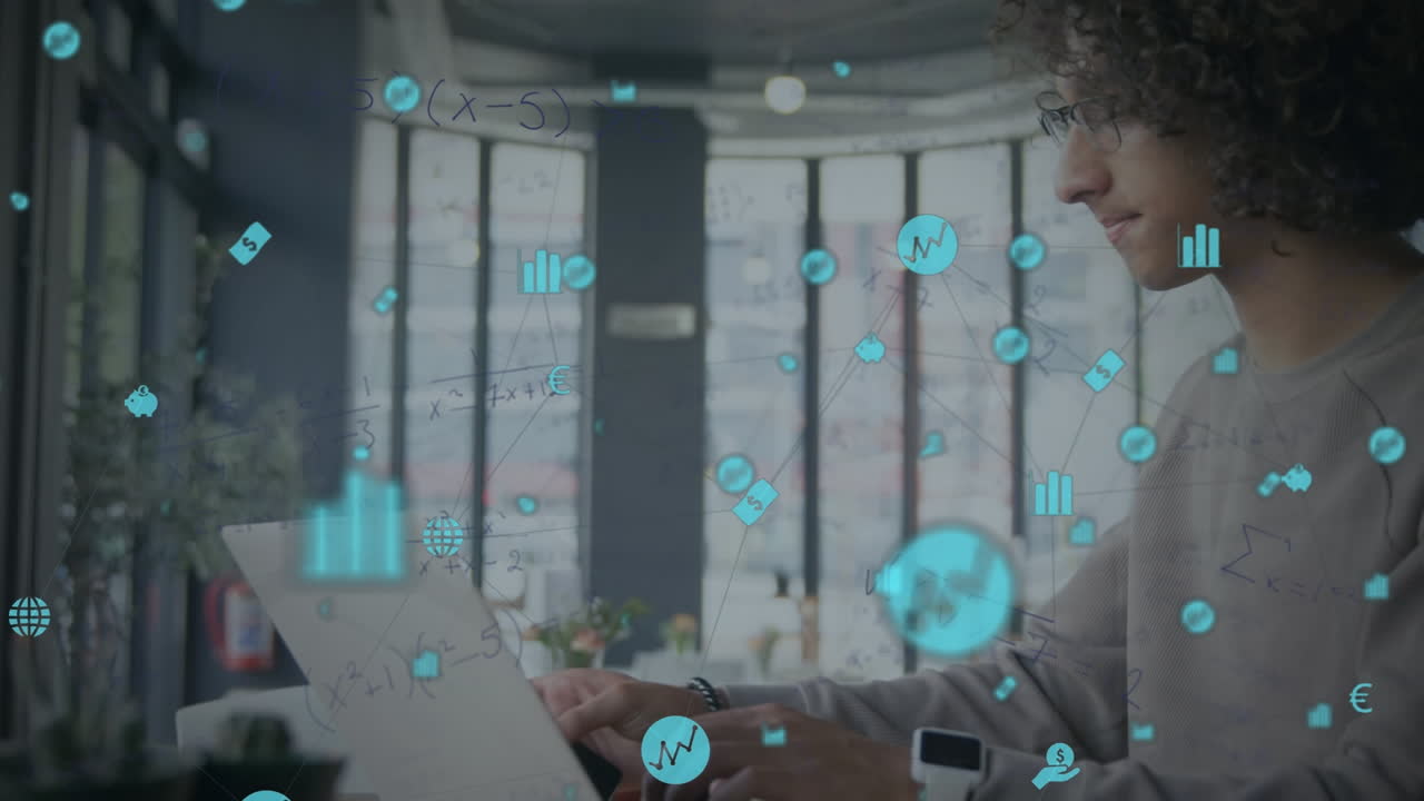 Animation of globe with connections and icons over biracial businessman using laptop