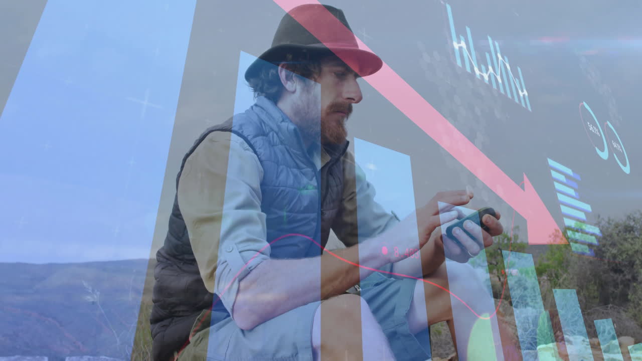 산에서 스마트폰을 사용하는 백인 남성에 대한 금융 데이터 처리의 애니메이션