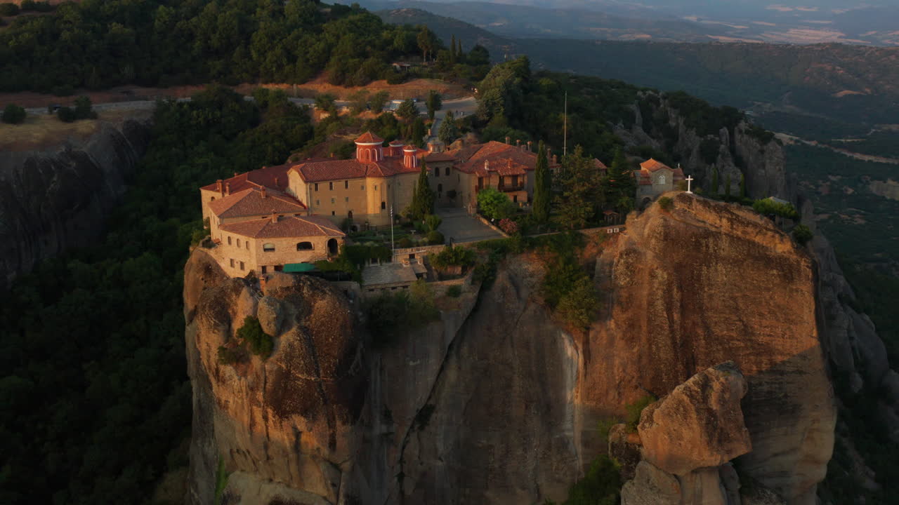 Aerial View of a Monastery on a Clifftop at Sunrise