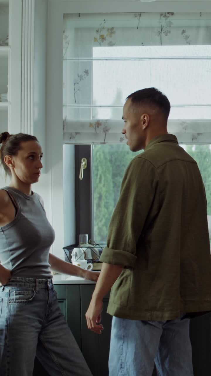 Couple Arguing in Kitchen