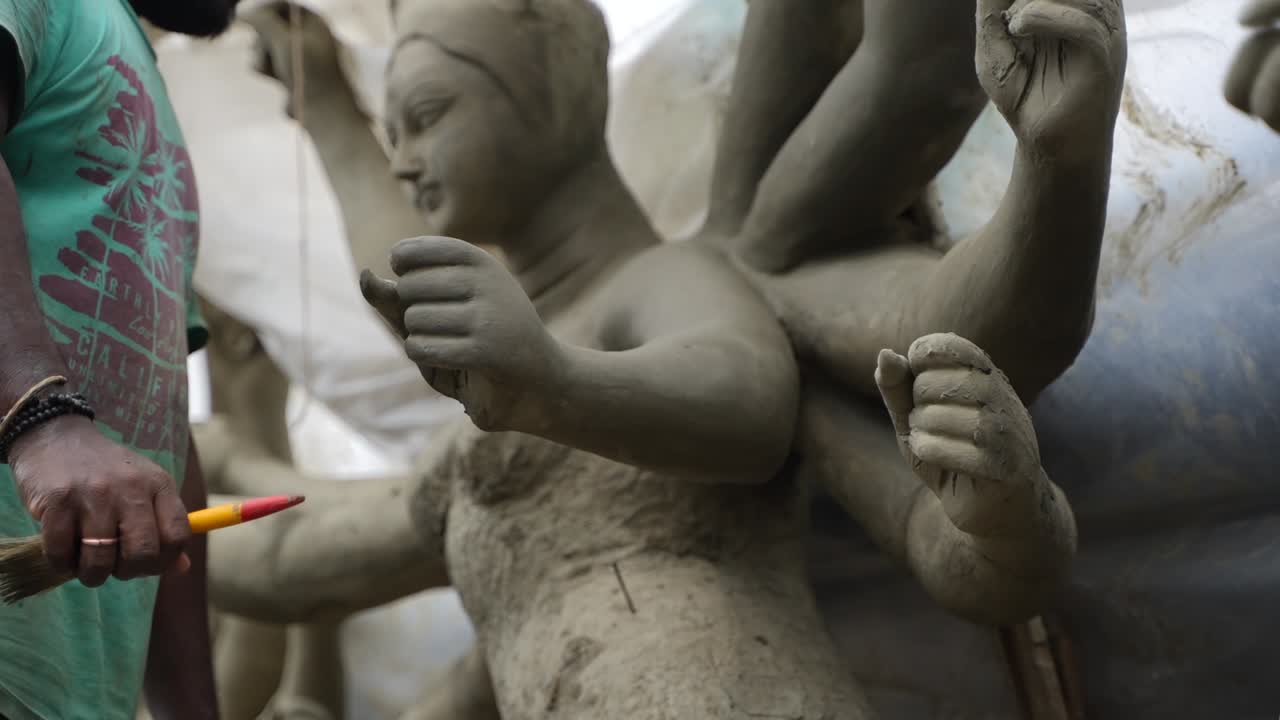 In Kumortuli, idol artists are making idols of Durga, the revered deity of Hinduism. The work of making these idols starts from June and these potters make many idols till November.