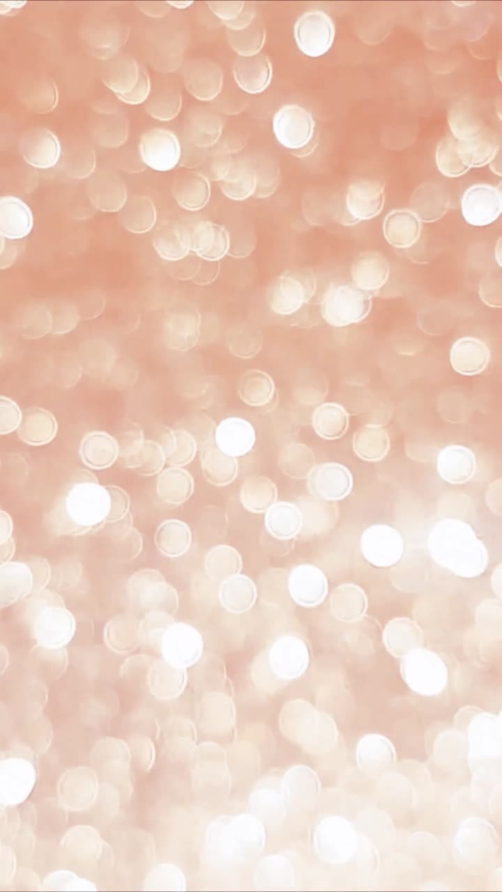 Loop di sfondo scintillante con luci bokeh glitter oro rosa