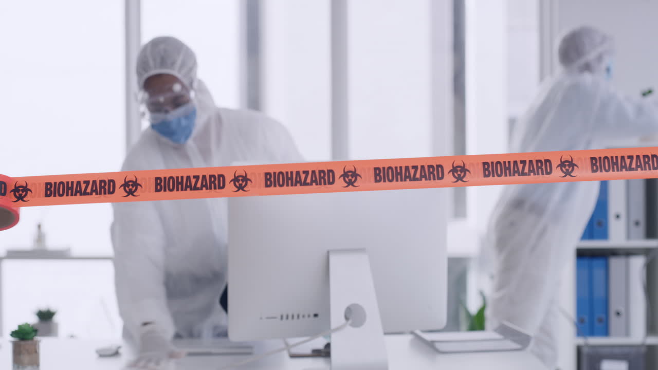 Cleaners cleaning up and sanitizing a room