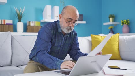 Retired-old-man-working-from-home.