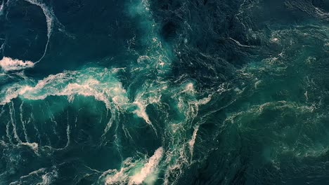 waves of water of the river and the sea meet each other during high tide and low tide.