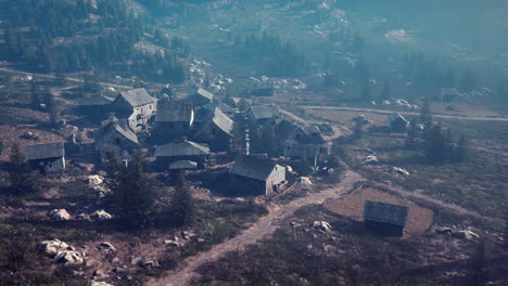 old wooden village on the rocky mountain background