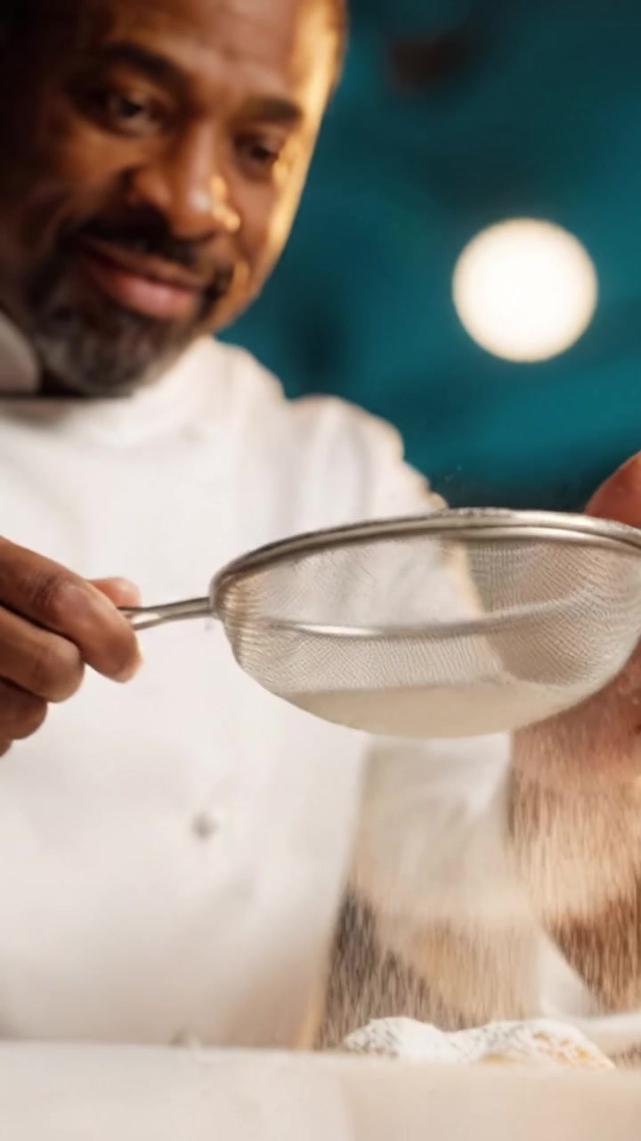 Masterful Chef Sifting Flour with Precision, Capturing the Artistry of Culinary Expertise in the Kitchen, Creating Magic with Every Delicate Movement