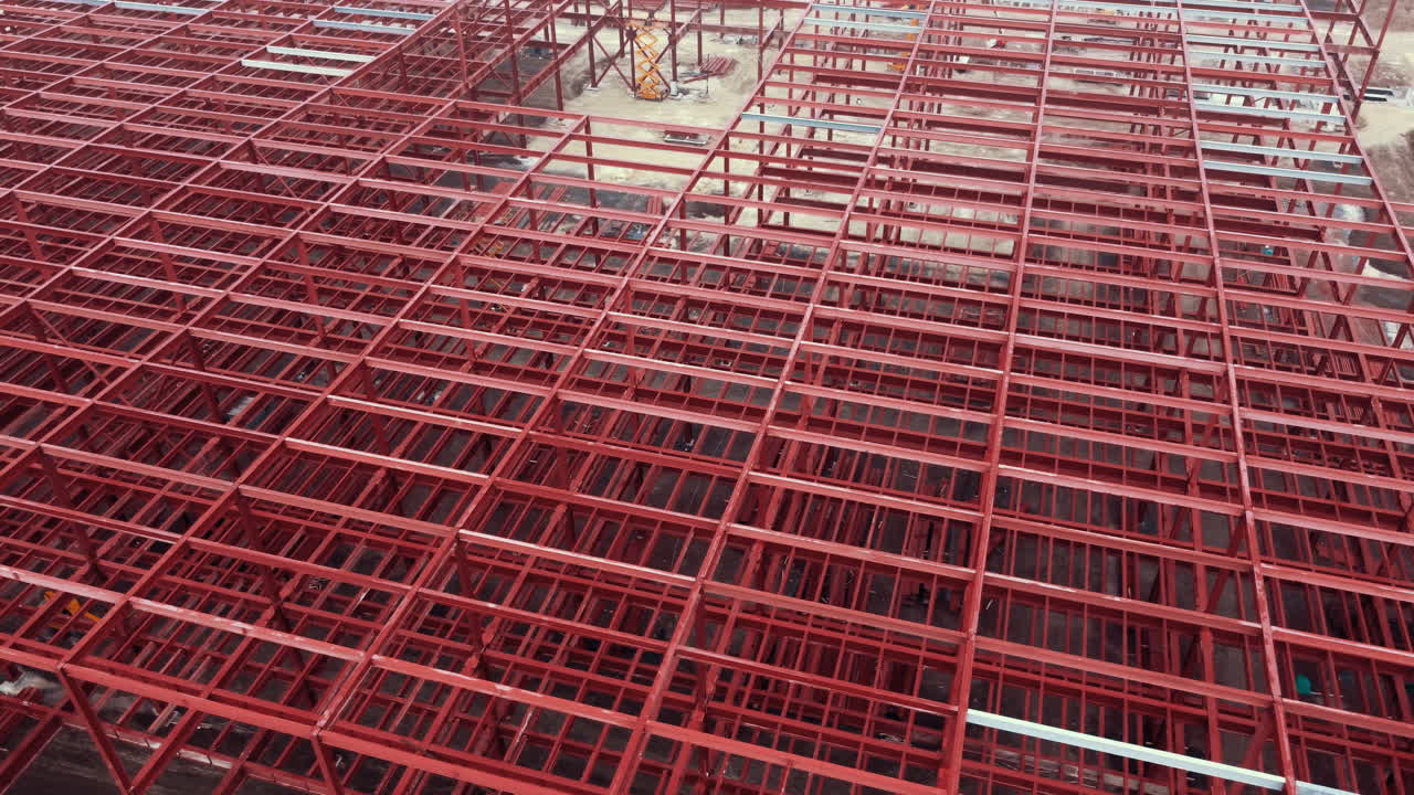Aerial View of a Large Industrial Building Under Construction
