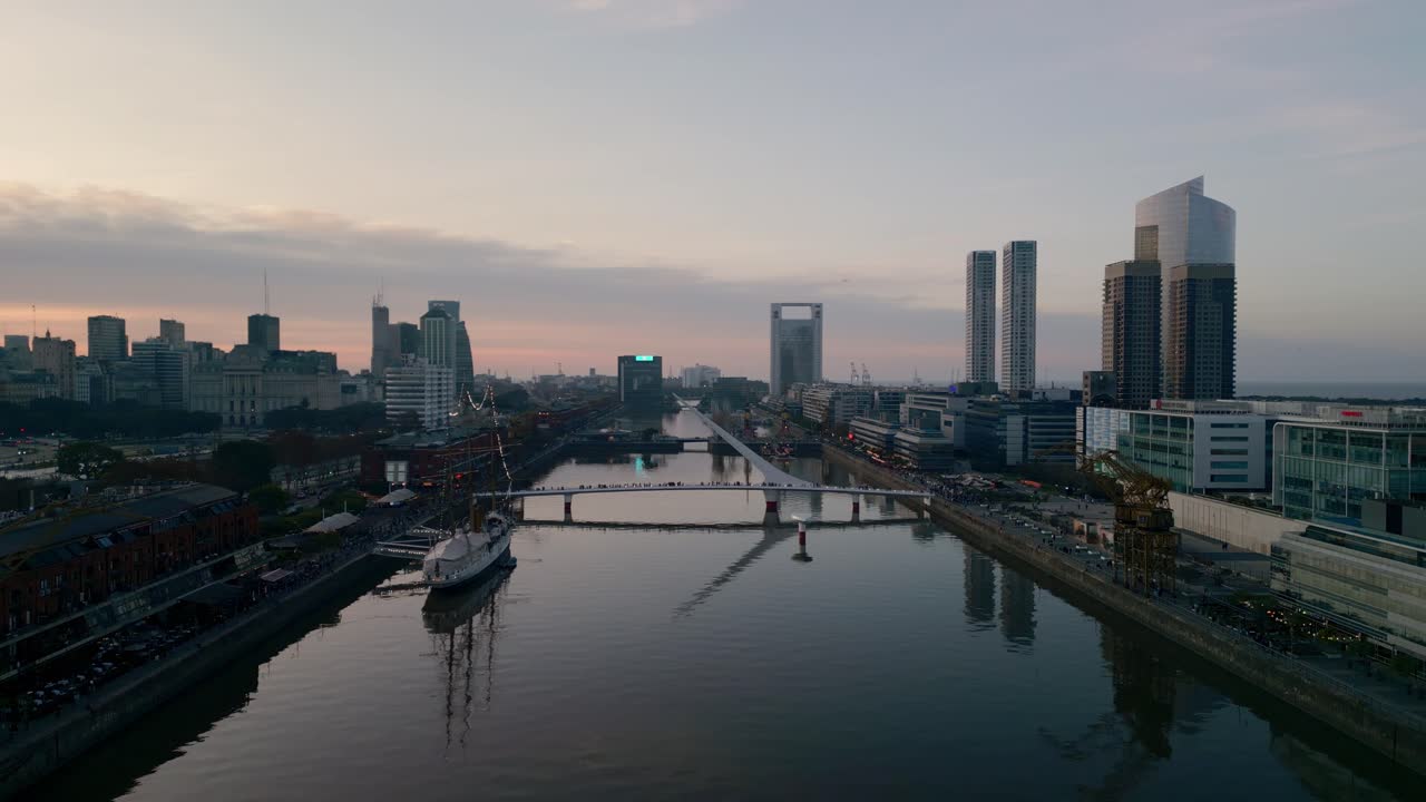 Aerial drone view at sunset of the bridge in the suburb of Puerto Madero, Buenos Aires, Argentina