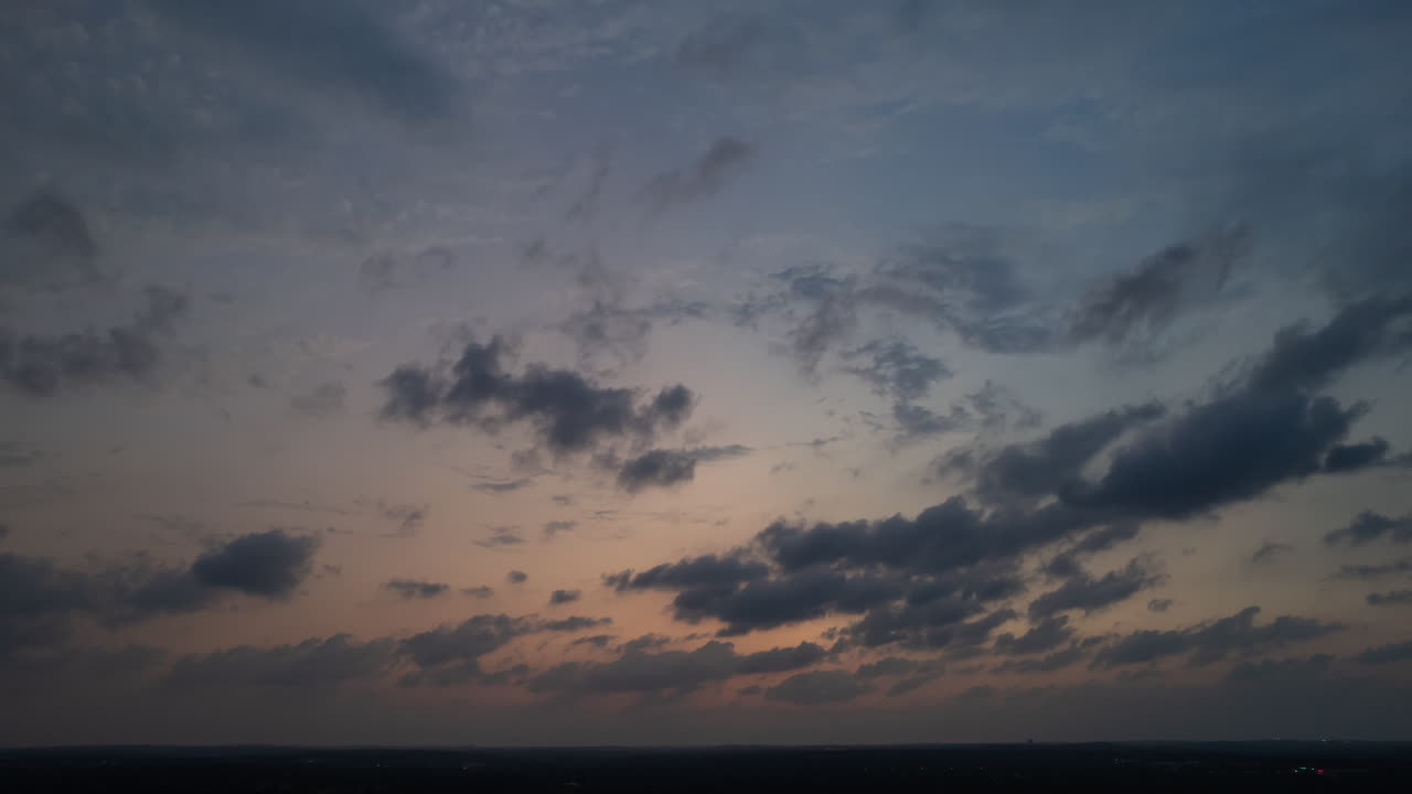 Sunset hyper lapse with beautiful orange sky and clouds