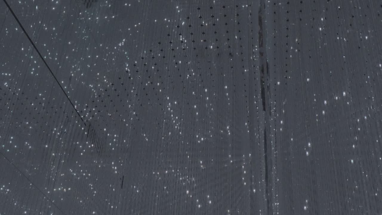 Vibrant light strips smoothly transitioning through a spectrum of colors, creating a dynamic and captivating visual experience.