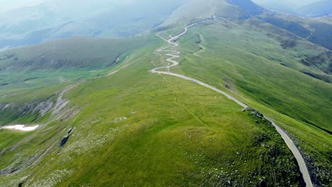 aerial drone footage of a romanian mountain road – transalpina