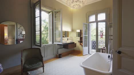 a spacious bathroom in light tones