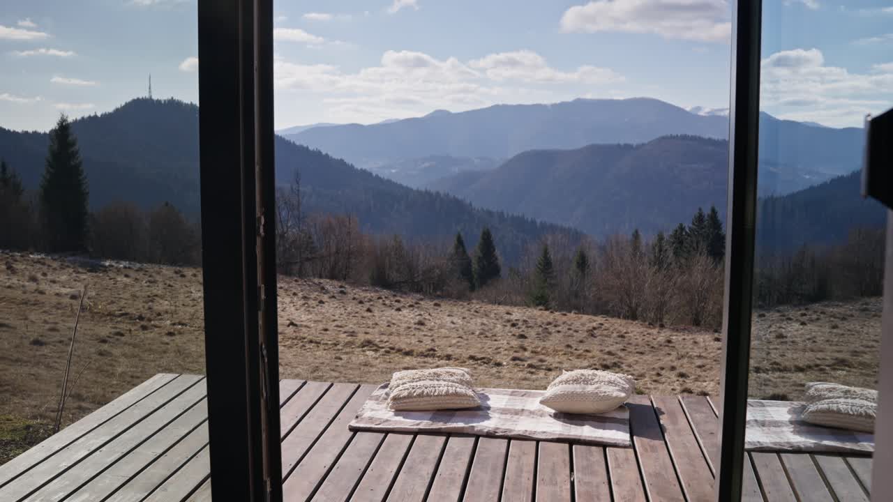 Scenic mountain view from a cozy deck