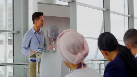 male speaker speaking to the public in the business seminar 4k