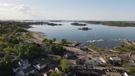 Beautiful-cinematic-aerial-drone-shot-of-boats,-islands-and-water-connected-to-Boston-Harbor