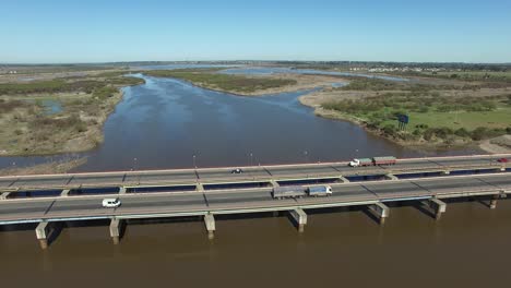 Aerial-View,-Traffic-on-Interstate-Highway-Bridge-Near-Santa-Fe-City,-Argentina