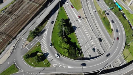 aerial view over busy intersection and railway lines, sweden