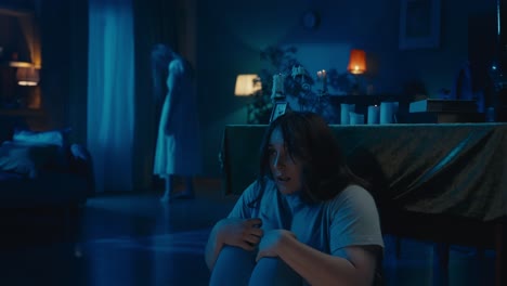 video of a young woman sitting hiding behind the table from from an otherwordly creature entity - video of a young woman sitting, hiding behind the table from from an otherwordly creature, entity, ghost. woman calls somebody, looking back. midnight, candles, lamps, low light. paranormal activity