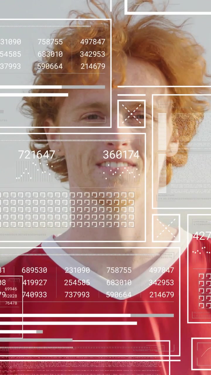 Red-haired man facing camera outdoor head turning, wind starting AR HUD animating grids over torso