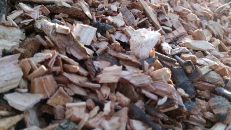 organic wood mulches pile close up for garden throwing wood chips