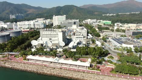 cluster of satellite broadcast dishes on hong kong, aerial view