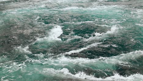 waves of water of the river and the sea meet each other during high tide and low tide.