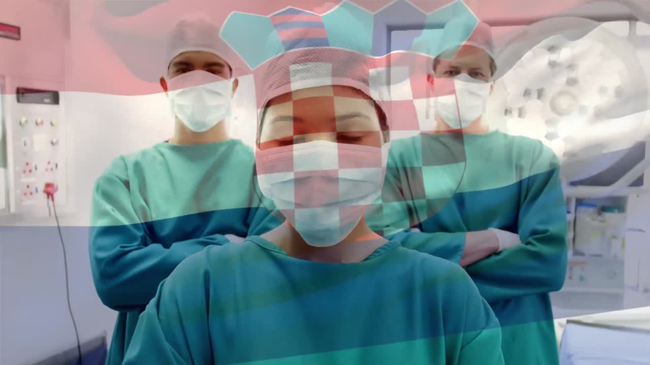 animación de la bandera de croacia ondeando sobre los cirujanos en el quirófano