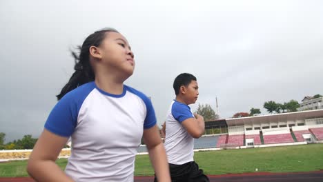 children running on the track