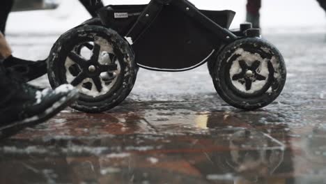 Baby-strollers-on-wet-street-in-Helsinki