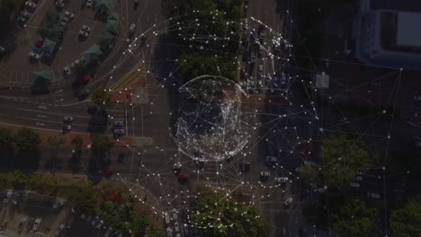 Animation-of-global-network-of-connections-rotating-over-aerial-view-of-city