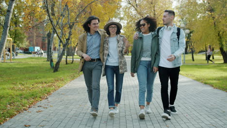 friends enjoying an autumn day in the park