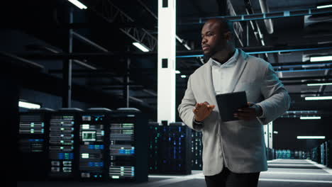 vertical video server room admin doing troubleshooting to prevent downtime