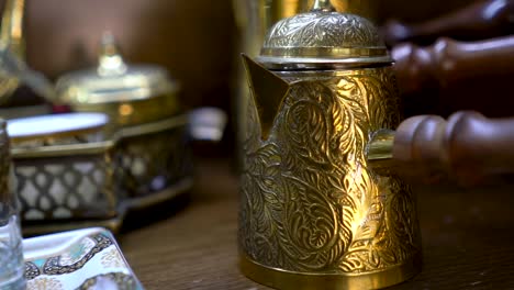 Golden-Kettle-In-Souk-Madinat-Jumeirah-In-Dubai,-United-Arab-Emirates---close-up