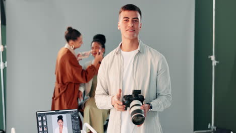 photographer, makeup artist, and model in studio photoshoot