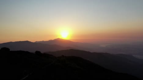 bright golden sunset over the mountain range