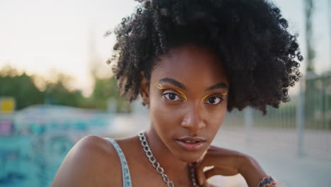 portrait of a young woman in a skate park