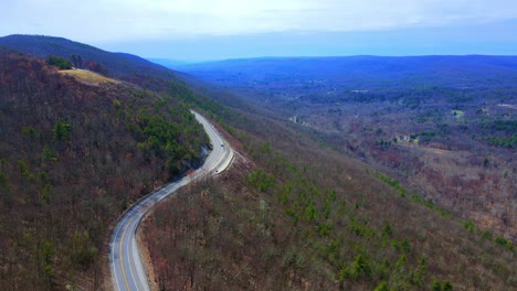 aerial drone video footage of a scenic, beautiful, winding mountain highway in the appalachian mountains