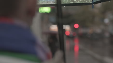 Walking-with-umbrella-under-the-rain