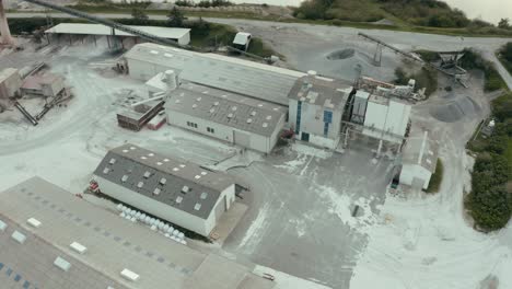 industrial building and equipment seen from drone