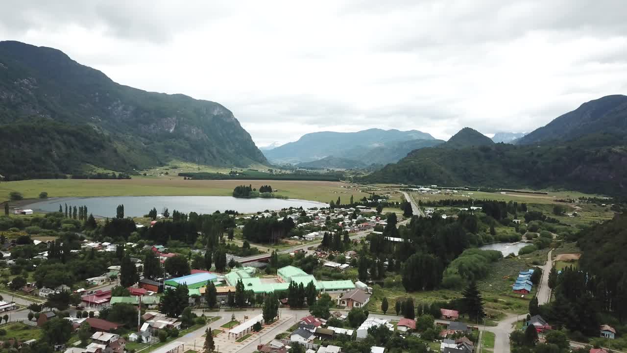 Villa Maniguales, Chile. Aerial View of Small City in Valley Under Andes Mountains