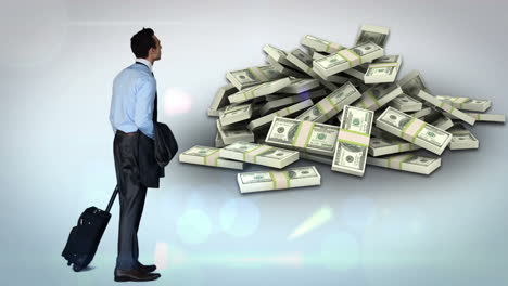 businessman looking at money pile