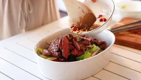 preparing a thai beef salad